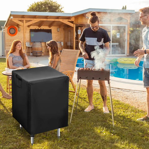 Outdoor Prep Table Cover 24x24x34 Inches beside a BBQ grill in a patio setting, showcasing weatherproof Oxford fabric protection.