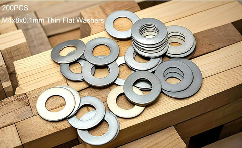 Ultra Thin Stainless Steel Flat Washer Set for M4 Screws, 8mm Outer Diameter, 0.1mm Thick, 200 Pack displayed on wood