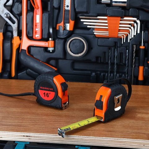 Fifteen Pack 16 Foot Retractable Tape Measures With Easy Read Fractions 1/8 In Orange Case on wooden table with tools