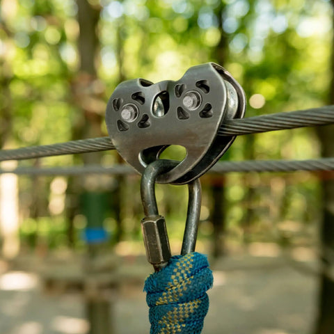 Double Zip Line Pulley Trolley With Tandem Dual Speed Pulleys 30kN 6700LBS Break Strength attached to rope with carabiner