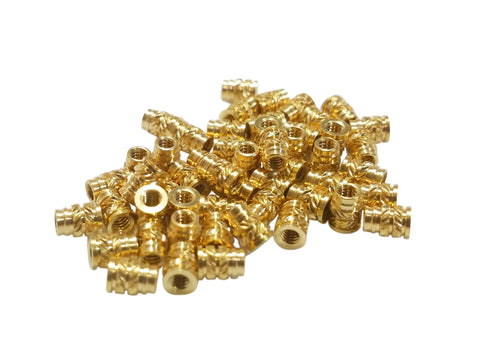 Heavy Duty Brass Heat Set Inserts For 3D Printing And Plastic Components 10-24 Threaded Nuts, showing a pile of metal inserts.
