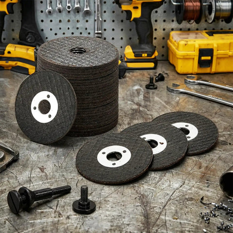 Stack of 50 Pack 2 Inch Die Grinder Cut Off Wheels With 3/8 Inch Arbor For Air Grinders And Rotary Tools Includes 1/4 Inch Stem Mount Mandrel Kit For Mounting Small Discs Pro Grade Mini Metal Cutter Discs For DIY Projects on a workbench.