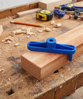 Hella Precise Center Finder Tool Set For Weekend Warriors Pro Level Center Marking Gauge and Scriber Positioner on a wood block.