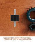 Four Piece Built For The Grind Anti Vibration Rubber Studs M10 Double Screw Mounts on wooden surface with gears.