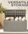 Beefy 220 Gallon Outdoor Deck Storage Box with Removable Divider open showing pillows and blankets inside on patio