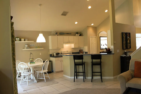 Kitchen and dining area illuminated by 12 Pack PAR30 Short Neck LED Bulbs 8W Equivalent 75W Dimmable Spot Lights, 90+ CRI.