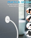 Totally Cool Silicone Cable Hole Covers To Tidy Up Your Desk Or Wall Grommets That Hide Unsightly Messy Wire Cables Everywhere For A Clean Room Vibe And Easy Portable Install Anywhere You Need. White silicone cable grommet on gray wall with one cable