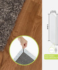 Close-up of 12 Pack Non Slip Rug Pad Grippers Washable And Reusable For Rugs installed on hardwood floor, showing edge detailing.