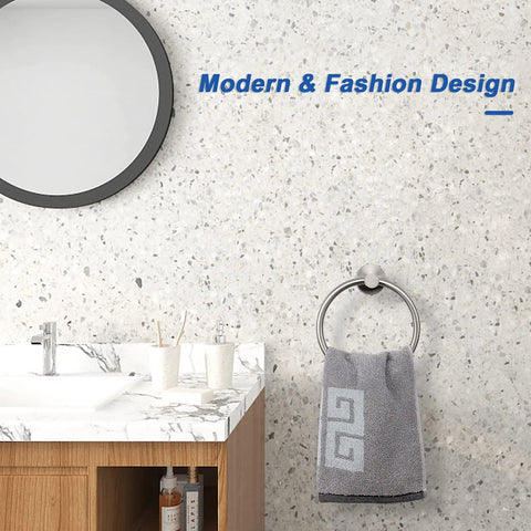 Bathroom scene with Brushed Nickel Round Towel Ring Wall Mounted Rustproof 304 Stainless Steel Hand Towel Holder, round mirror above sink.