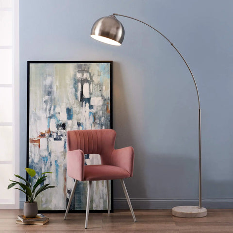 Arc Floor Lamp With Faux White Marble Base And Nickel Bell Shade For Living Rooms Offices Bedrooms Sleek Modern Mid Century Vibe Warm Ambient Task Lighting near pink chair and artwork.