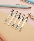 Close-up of gold clips on Black Gel Pens 0.5mm Fine Point Retractable With Smooth Quick Dry Ink and Metal Gold Clip 10 Pack A True Office Workhorse
