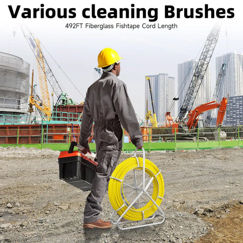 Worker holding Fiberglass Fish Tape 500Ft One Quarter Inch Duct Rodder Wire Puller with Steel Reel Stand at construction site.