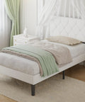 Twin Size Upholstered Platform Bedframe With Iconic Button Tufted Linen Headboard, Straight Up Comfy Memory Foam Cushioning, Heavy Duty Wood Slat Support, No Box Spring Required, Crisp White Aesthetic For Serious Sleep Vibes in a bright room.