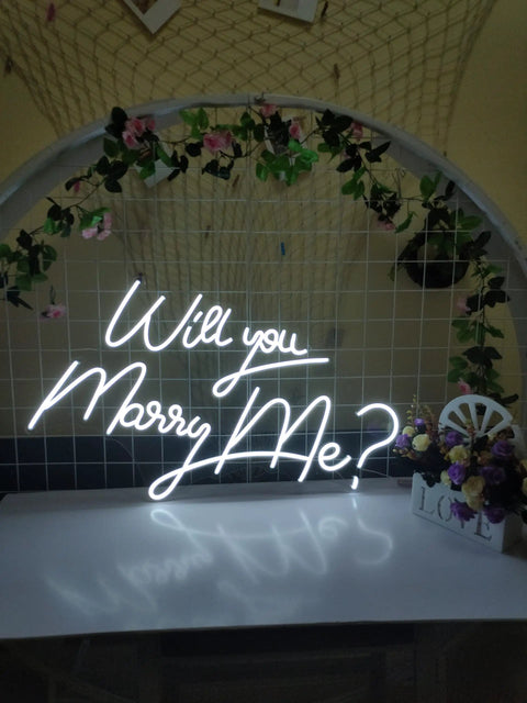 27.5 Inch Will You Marry Me Neon Sign With Dimmer Switch For Wedding Wall Decor glowing cool white in floral setting
