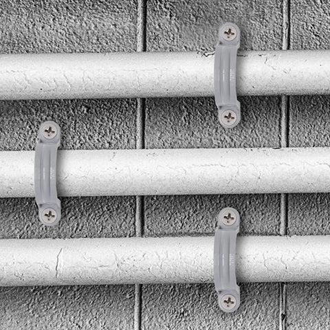 Killer One Inch Pvc Pipe Straps With Two Holes Rock Solid Conduit Clamps And Plastic Pipe Supports In Grey Color on pipes.