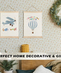 Epic Hot Air Balloon And Airplane Nursery Decor Set Of 2 Posters For Boys Room 12x16 Inch Baby Boy Wall Art With Built In Wooden Hanger Frame Perfect Nursery And Toddler Playroom Hanging Sign showing wall display with wreath decor.