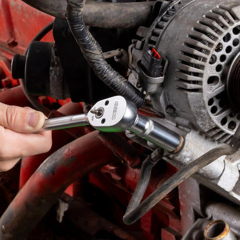 8 Inch 3/8 Inch Drive Ratchet With Standard Handle in use on automotive engine, showing reversible one hand operation in action