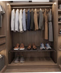 Heavy Duty Expandable Closet Shelf And Stackable Cabinet Organizer Set Black Adjustable Vertical Divider Rack holding shoes in a closet.