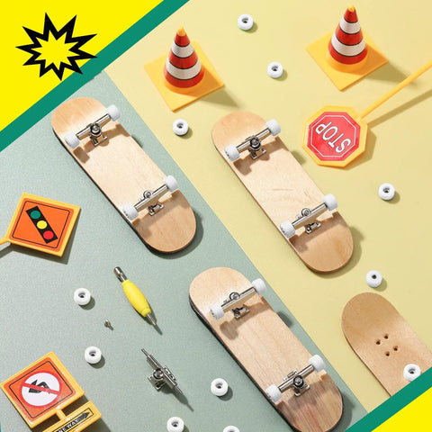 Eight Piece Fingerboard Bearing Wheels And Tool Kit White Wheels With Alloy Racks And Screwdrivers Plus Nut Drivers For 34mm Wide Decks Finger Skateboard Trucks shown with traffic-themed props.