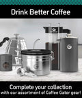 Premium French Press Coffee Maker With Built In Measurement Marks For Smooth Daily Brews Made From Safe Non Toxic Materials In Sleek Silver next to coffee gear.