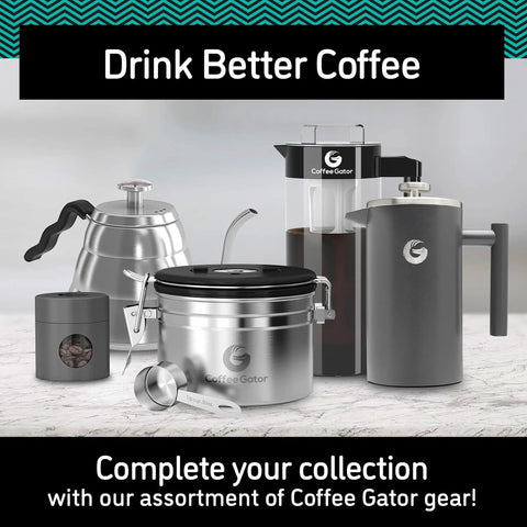 Premium French Press Coffee Maker With Built In Measurement Marks For Smooth Daily Brews Made From Safe Non Toxic Materials In Sleek Silver next to coffee gear.