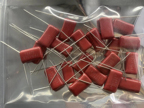 20-piece Metallized Polypropylene Film Capacitors Kit, CBB22 Style, 630V, 0.1uF 104J, P15 Case, red housing displayed in packaging.