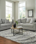 Living room with Shavontae Modern Table Lamps Set Of 2 27.5 Inch Gray Resin Bases With White Fabric Drum Shades on side tables.