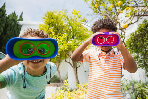 Two kids using Focus Free Binoculars For Kids Aged 4 To 8, Lightweight And Durable Outdoor Toy Gear With Neck Strap