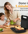 Mom and child cooking with the Super Awesome 3-In-1 Electric Sandwich Maker With Removable Nonstick Plates, 1000 Watts for making waffles.