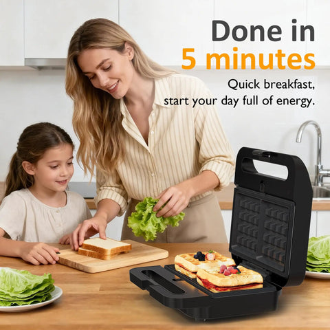 Mom and child cooking with the Super Awesome 3-In-1 Electric Sandwich Maker With Removable Nonstick Plates, 1000 Watts for making waffles.
