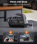 H2 Pro Cordless Tire Inflator Portable Air Compressor with dual power storage compartment shown on table, with 12V DC adapter visible