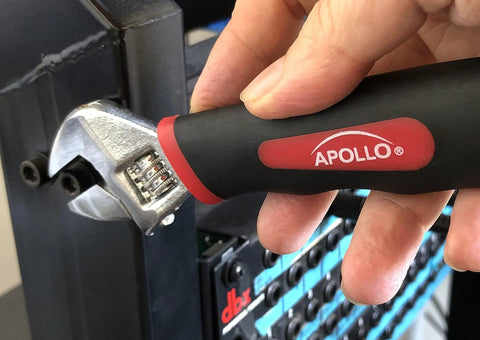 Hand using mini wrench from Tiny But Mighty Stubby Tool Set For Small Hands And Tight Spaces Includes Mini Hammer, Mini Screwdriver Set And Mini Wrench In Bright Red For Quick, Easy Access In Any DIY Project to tighten screw on metal surface.