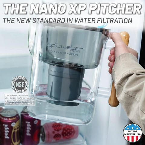Person placing No Fuss 10 Cup Gravity Water Filter Pitcher For Refrigerator With 150 Gallon Filter in fridge.