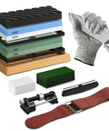 Complete Quad Sided Whetstone Knife Sharpening Kit with grit stones, honing guide, leather strop, and gloves on display