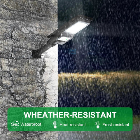 Solar Powered Motion Sensor Flood Light 1000LM 156 LEDs Waterproof Outdoor Security Lighting mounted on wall in rain