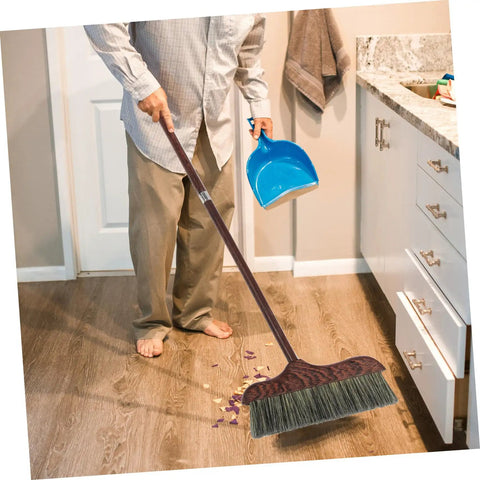 Person using Long Handle Heavy Duty Broom With Soft Beveled Bristles For No Sweat Dust Removal on hardwood floor.