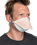 Person wearing N95 Duckbill Respirator Mask For Everyday Use, ASTM Level 3 Protection, Regular Size, Orange, Pack Of 6