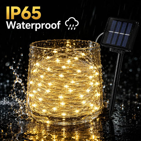 Outdoor Solar String Lights With 100 LEDs 33 Feet 8 Modes Weatherproof Fairy Lights glowing in water showing IP65 waterproof feature.