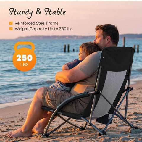 Man and child sitting on foldable camping beach chair for adults with cup holders, low profile high back, extra wide seat, black