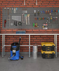 Rock Solid Heavy Duty Stainless Steel Work Table With Open Base Commercial Grade Metal Prep Bench For Restaurants Garages And Workshop Areas 84 Inch Long By 14 Inch Deep with tools and vacuum.