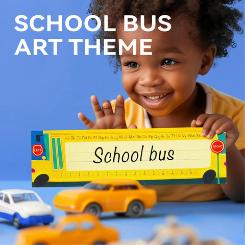 Child holding colorful desk name plate with school bus art and alphabet, part of 40 Pack Desk Name Plates For Classroom With Alphabet And Number Line, Traditional Manuscript Style Desk Labels For Students, 12 Inch By 3.5 Inch, Kid Friendly Classroom Organization