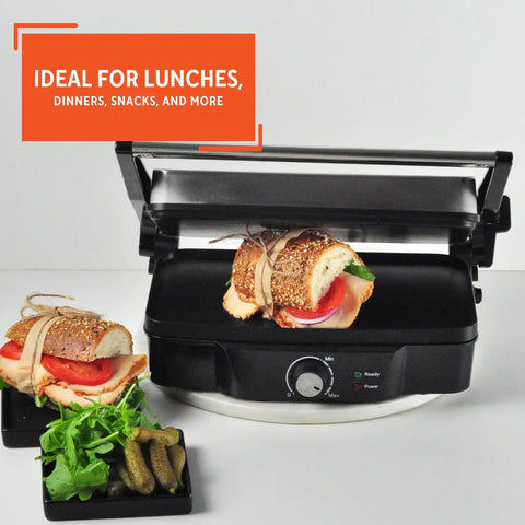 Imusa Electric Panini Press Griddle With Non Stick Cast Aluminum Plates Adjustable Thermostat Control For Gourmet Sandwiches And Toasts Compact Design 1200 Watt Power Heating Element Ideal For Busy Kitchens with sandwiches and fresh ingredients visible.