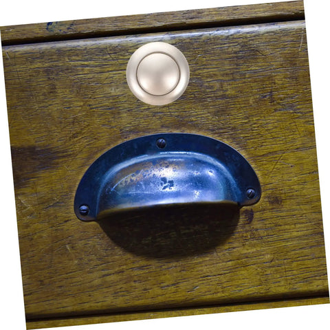 Keyless Push Button Door Latch Lock For Rv Cabinets And Drawers Low Profile Build Heavy Duty Zinc Alloy Hardware mounted on wooden drawer.