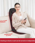 Woman using Vibration Back Massager Seat Cushion With Heat 10 Motor Chair Pad For Pain Relief At Home On Sofa