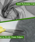 Close-up of black Mosquito Netting 10x39 Feet 1Mm Mesh Garden Pest Barrier with scissors cutting 40D polyester fabric.