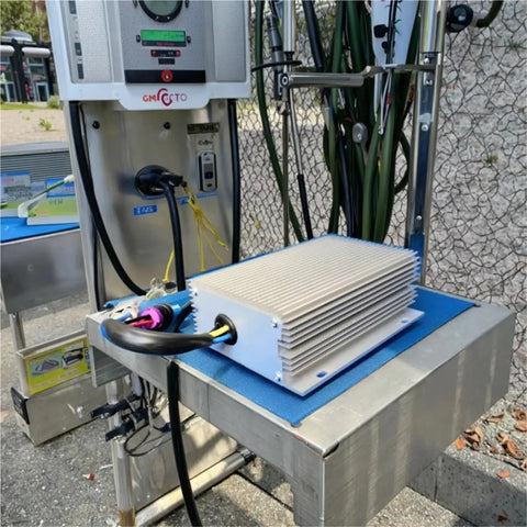Top Shelf Electric Vehicle DC To DC Step Down Converter 500 Watts 72 Volts To 12 Volts on metal table with connections.