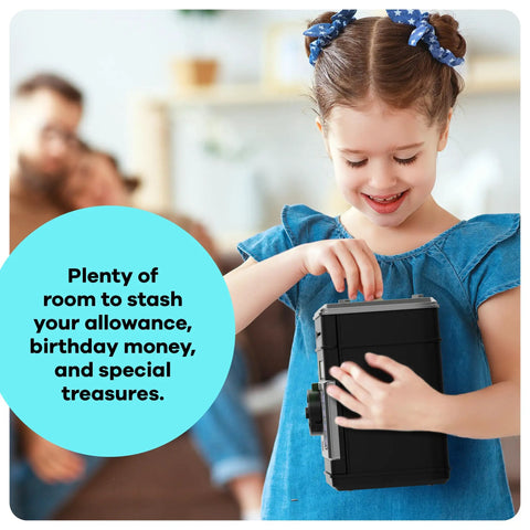 Child playing with Electronic Piggy Bank For Kids With Passcode Lock And ATM Style Safe A Kid Friendly Coin Bank Toy For Ages 3 To 12
