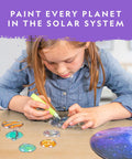 Solar System Stained Glass Suncatcher Craft Kit For Kids With Acrylic Sun And Planets, Glow In The Dark And Metallic Paints, Suction Cups And Hanging Supplies For Window Art Or Mobile, Build Your Own Outer Space Decor. Girl painting acrylic planets