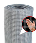 Close-up of Heavy Duty Hardware Cloth With One Half Inch Square Openings, 48 Inch By 100 Foot Roll, 19 Gauge, with hand showing scale.