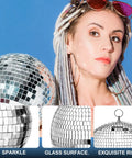 Person holding 65 Piece Disco Ball Decor Set With Mixed Size Reflective Hanging Mirror Orbs for Weddings and Parties